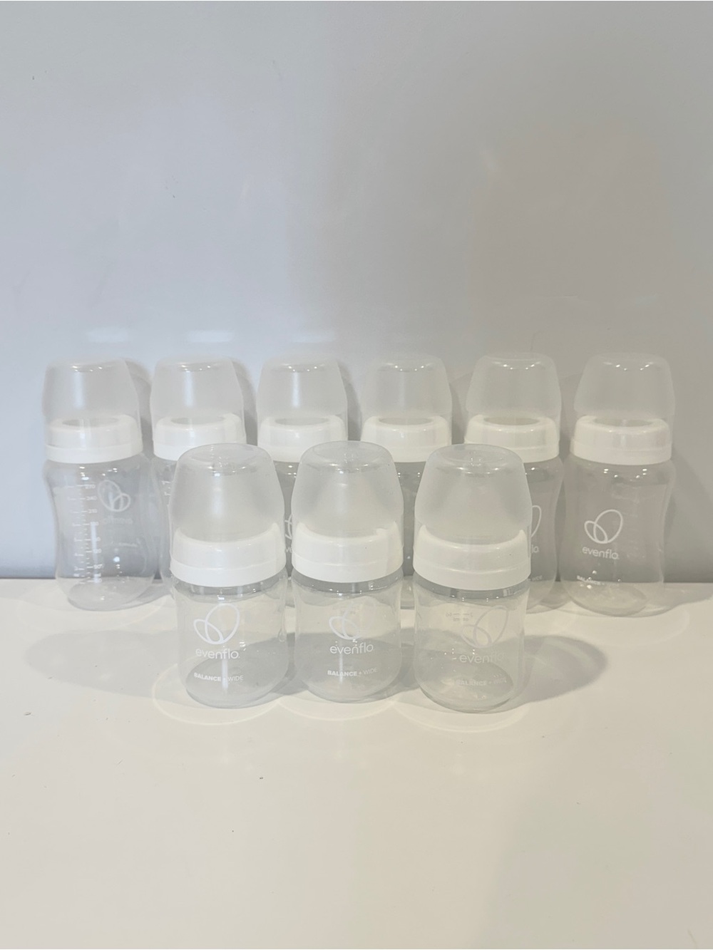9 Evenflo Baby Bottles Set
